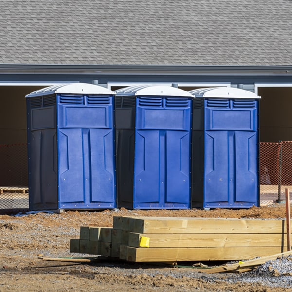 how often are the portable restrooms cleaned and serviced during a rental period in Premont